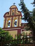 Glockenturm und rotem Ocker, Malaga, Spanien.