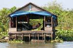Nickerchen in der Hängematte, Tonle Sap, Kambodscha.