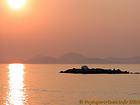 Sonnenuntergang auf dem Kontinent, Hydra, Griechenland.