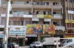 Werbeplakat weiblichen Cowboy an einer Wand, Aqaba, Jordanien.