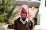Portrait der Mann mit einem keffiyeh, Aqaba, Jordanien.