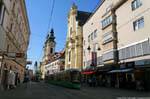 Landstraße, Kirchen und Straßenbahnen, Linz, Österreich.