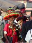 Ein Wasserträger, Jemaa el Fna, Marrakesch, Marokko.