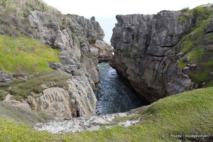 Meer Eingang zum Ort der Pancake Rocks, Punakaiki, Westküste - Neuseeland