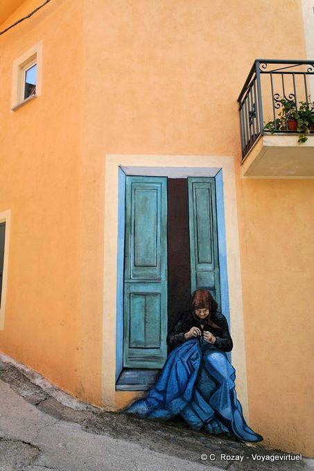 Orgosolo, die Näherin auf der No-Türwand - Sardinien