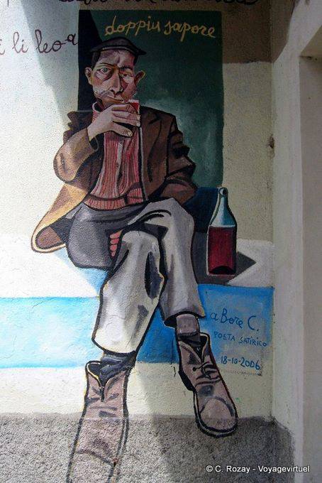 Orgosolo, Doppel Geschmack Hommage an C. Bore, Satiriker, Wandmalerei - Sardinien