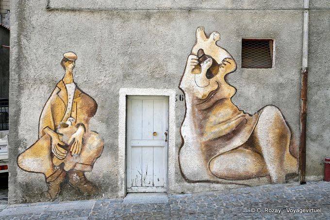 Orgosolo, Familiengeschichte, Wandbild an Fassaden, Via Alcide De Gasperi - Sardinien