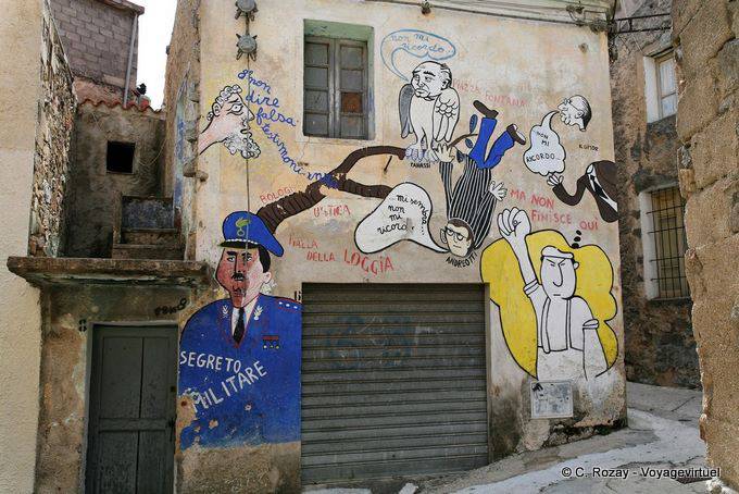Orgosolo, Gerüchte und militärisches Geheimnis, Wandmalerei - Sardinien