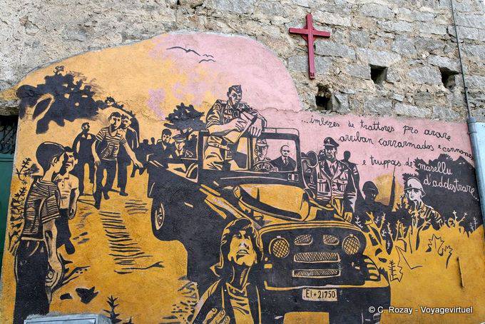Orgosolo, unter dem Kreuz kamen die Truppen, Wandmalerei - Sardinien